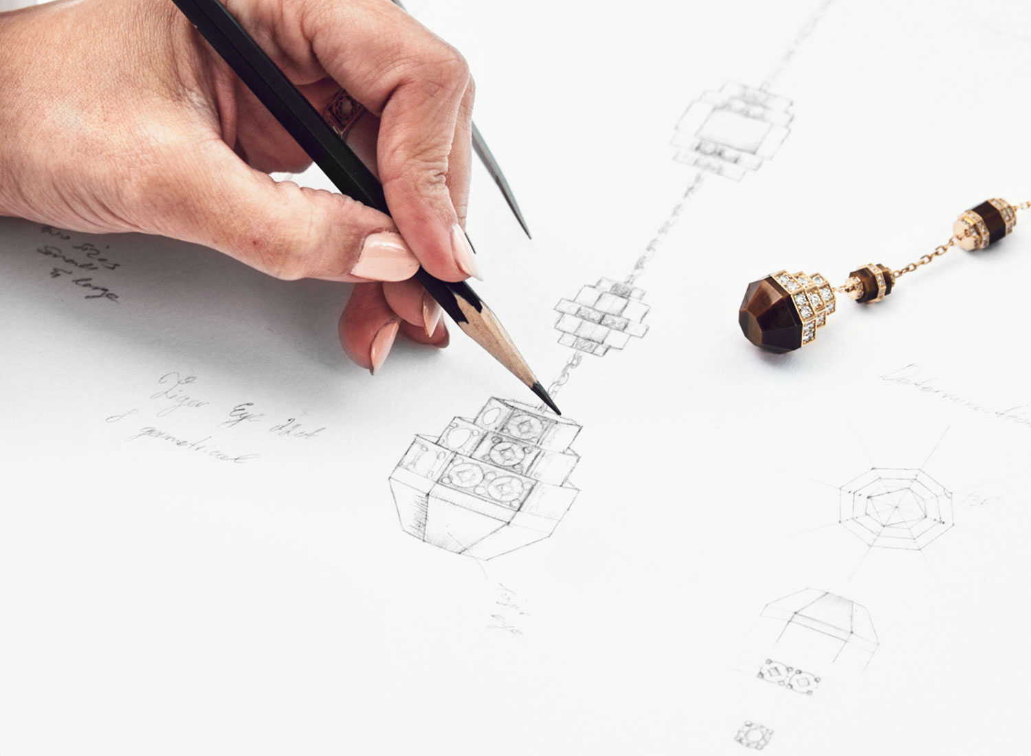 Fine jewellery illustration of a pendant, drawn with pencil to capture depth and dimension.